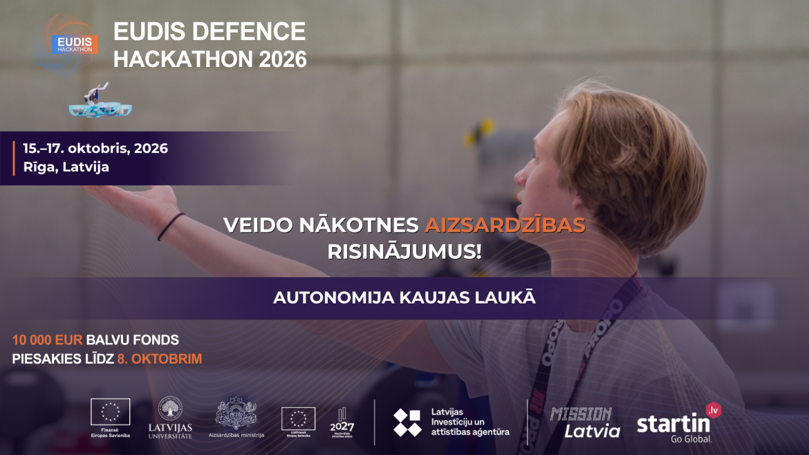 Jauns vīrietis, izstiepis labo roku, prezentē savu ideju konkursā